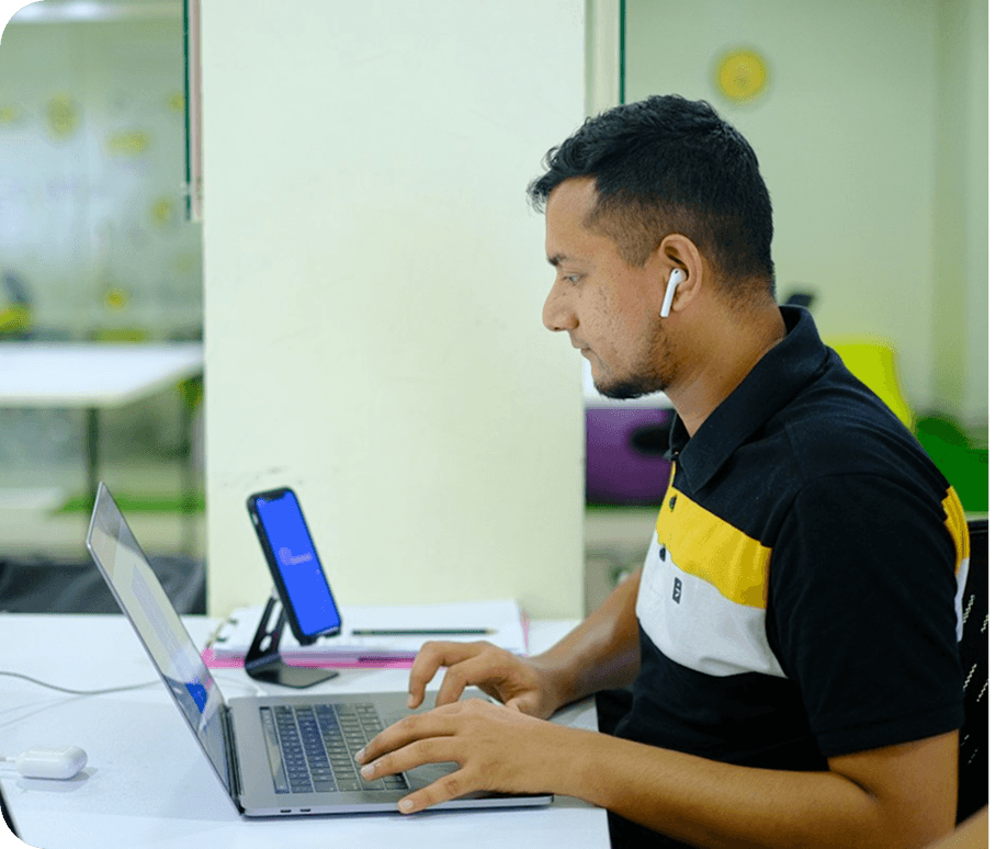 Engineer checking live production data on a tablet on the factory floor